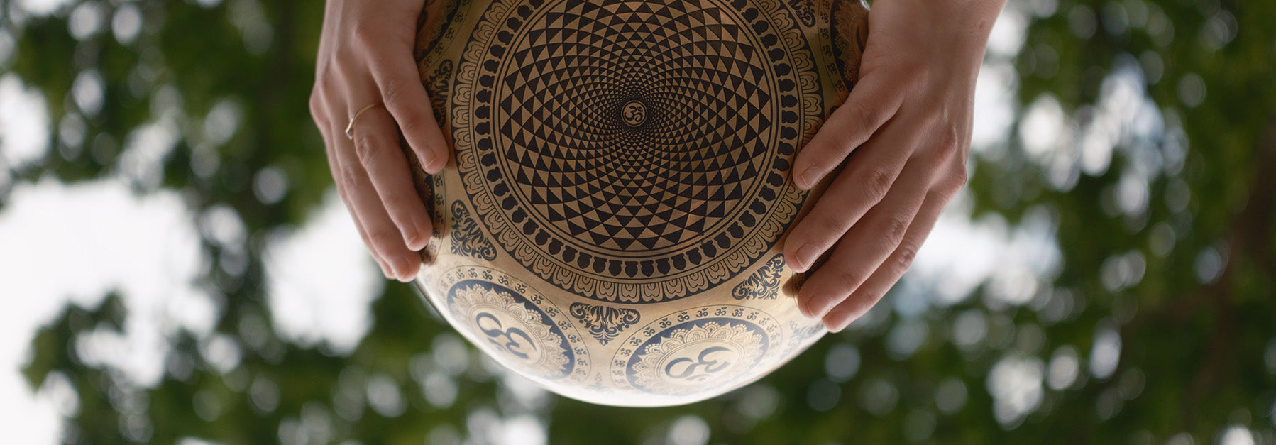 singing bowl sitting upon a cushion in a wooden space