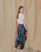 Woman wearing colourful harem pants