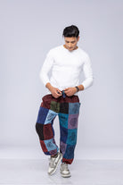 Man wearing patchwork pants