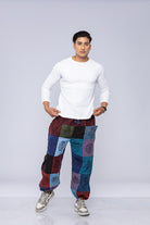 Man wearing patchwork pants