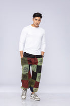 Man wearing patchwork pants