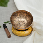 Singing bowl with cushion and mallet