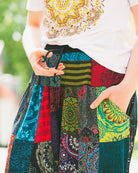 Woman wearing colourful harem pants