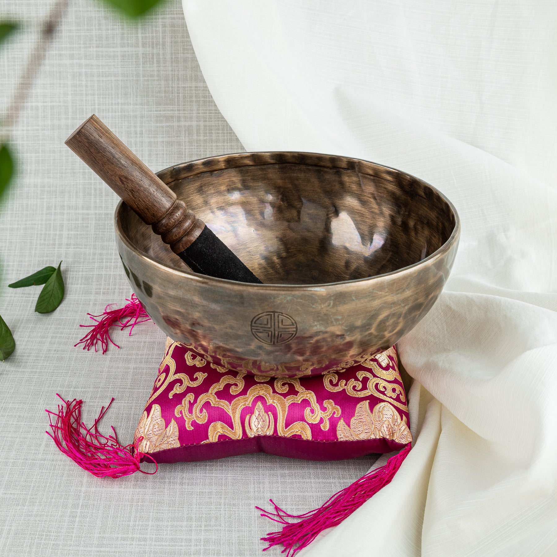 Pink cushion with singing bowl