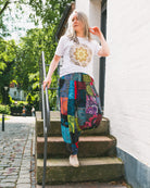 Woman wearing colourful harem pants