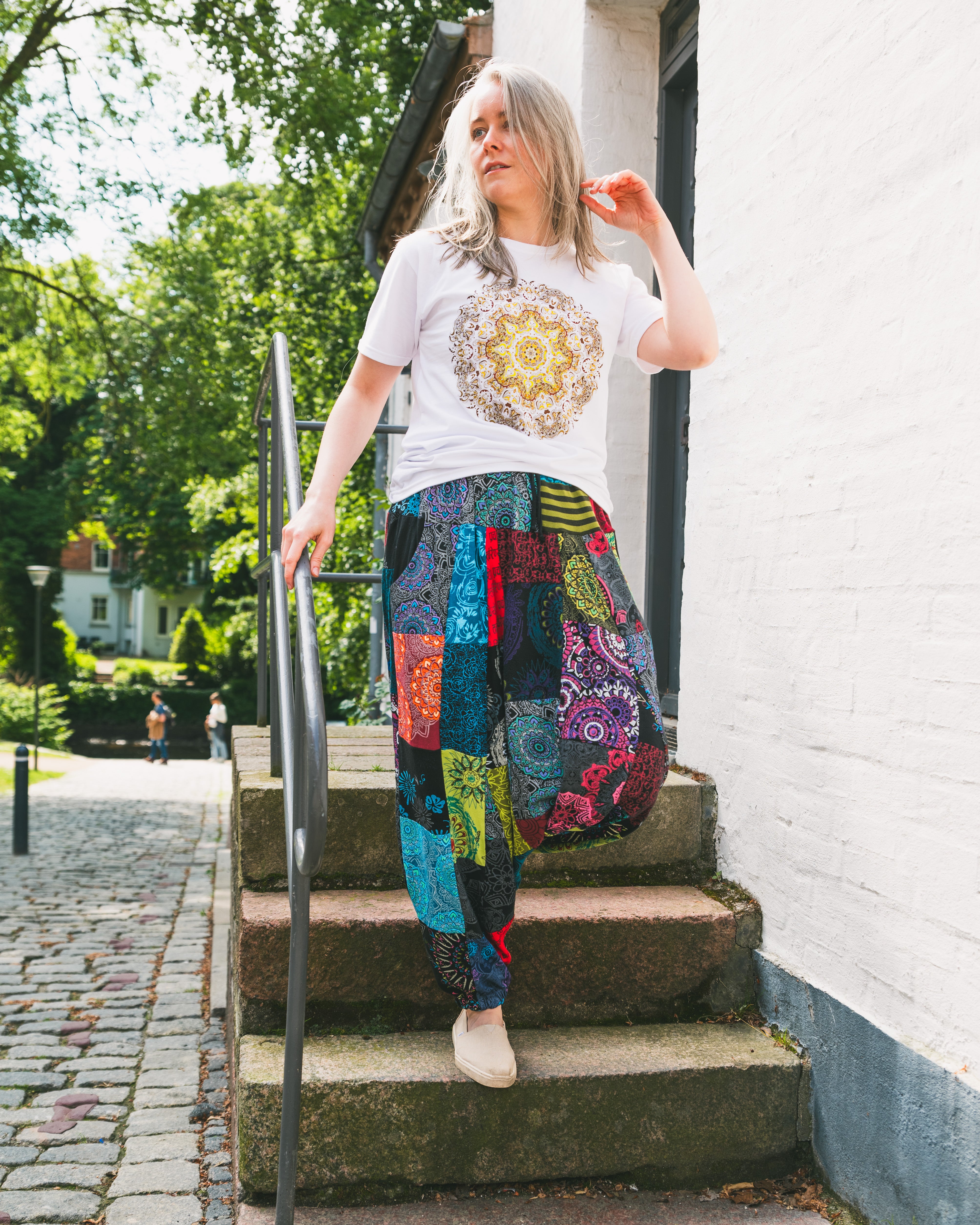 Woman wearing colourful harem pants