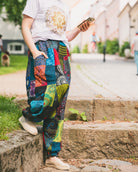 Woman wearing colourful harem pants