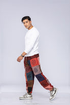 Man wearing patchwork pants