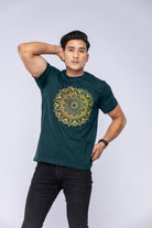 Man modelling a green mandala t-shirt